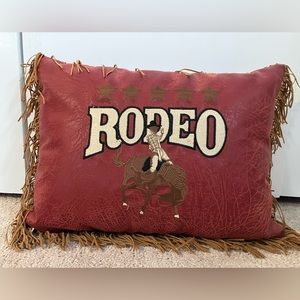 Western leather “Rodeo” accent pillow.
